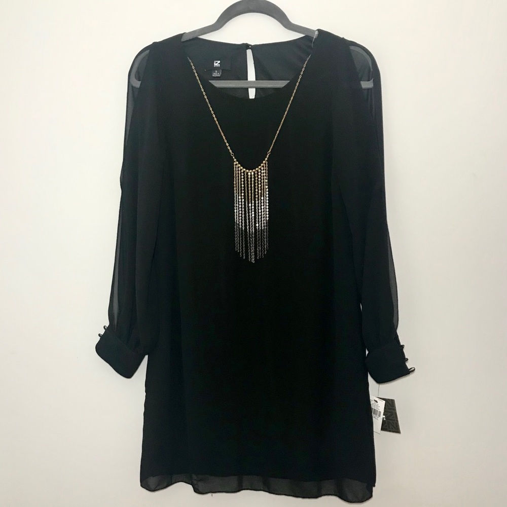 Black long sleeve dress with attached necklace